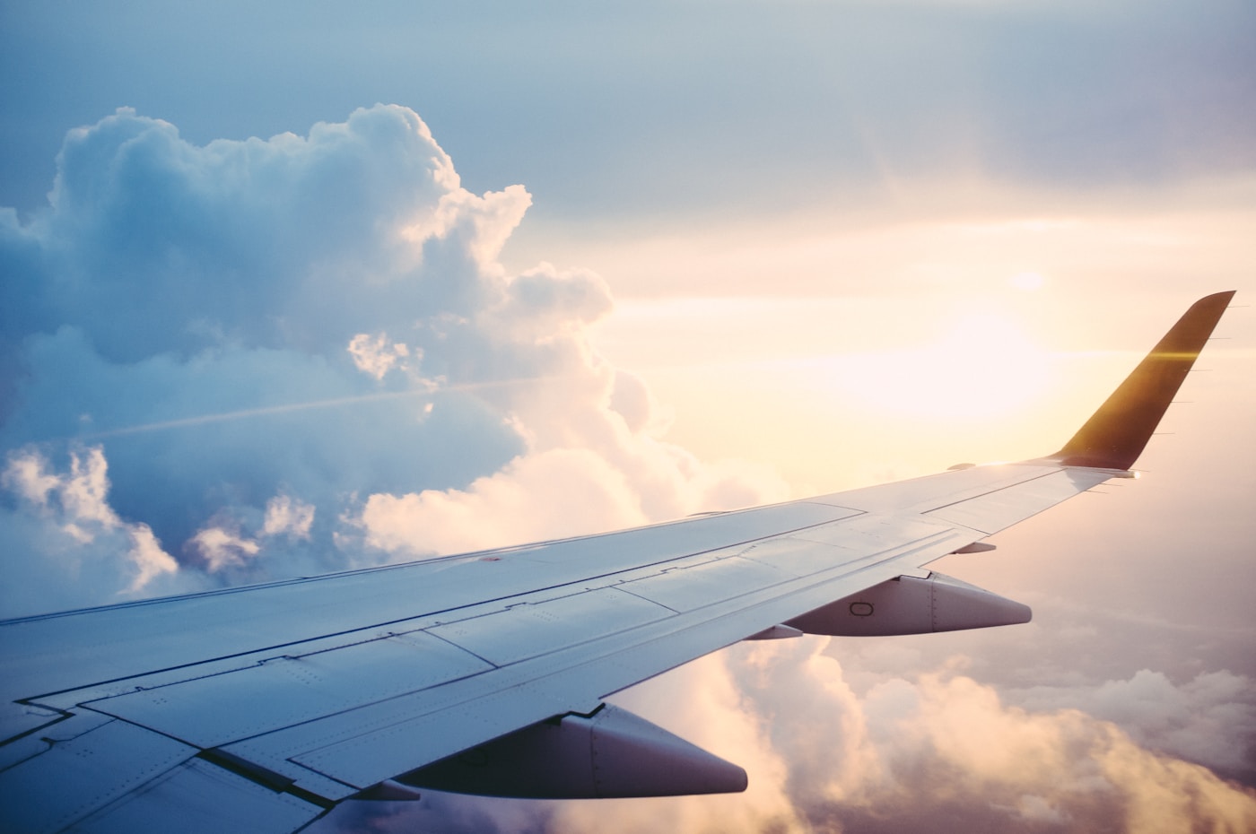 Private aircraft above clouds